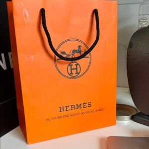 Hermès Signature Orange Bag with Black Handles